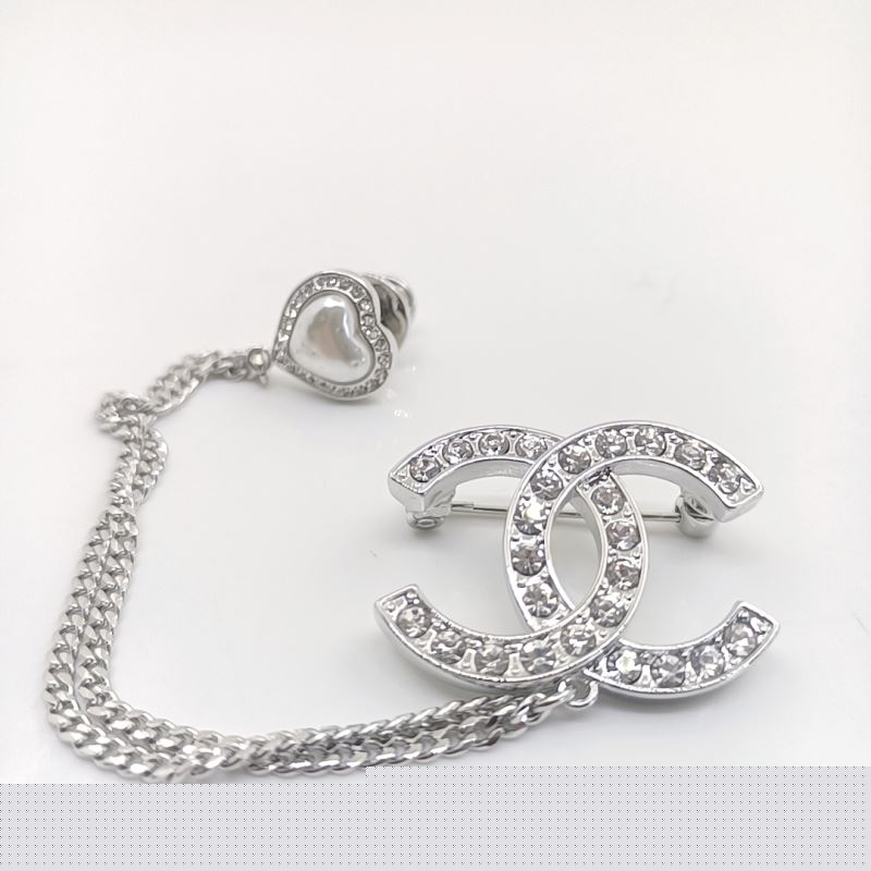 Ch*el brooches